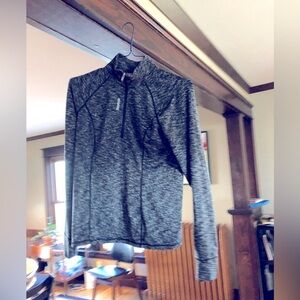 Women’s zip up Reebok running shirt